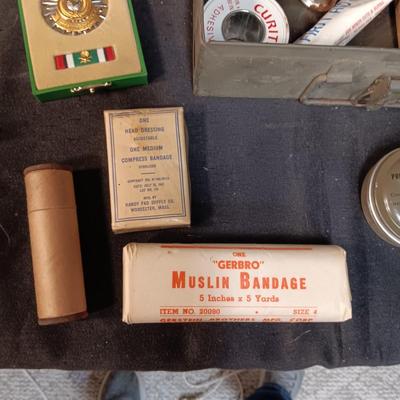 MILITARY FIRST AID KIT, DIE-CAST MODEL PLANE AND LIBERATION OF KUWAIT MEDAL