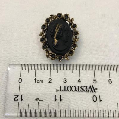 Carved black glass, Victorian cameo brooch