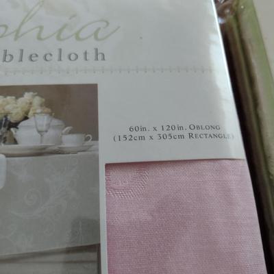 Collection of Table Cloths and Napkins- New in Package