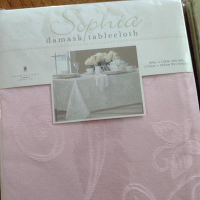 Collection of Table Cloths and Napkins- New in Package