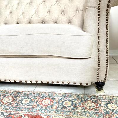 Tufted Cream Colored Sofa with Nail Head Trim