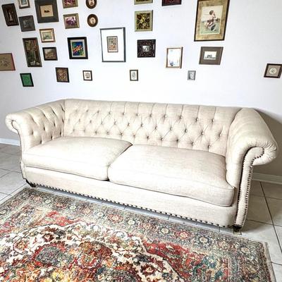 Tufted Cream Colored Sofa with Nail Head Trim