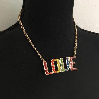 Betsey Johnson, rainbow stone love pendant necklace