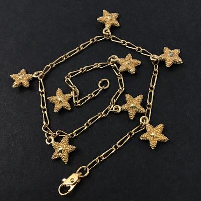 Gold tone star charm anklet