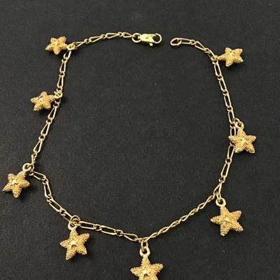 Gold tone star charm anklet