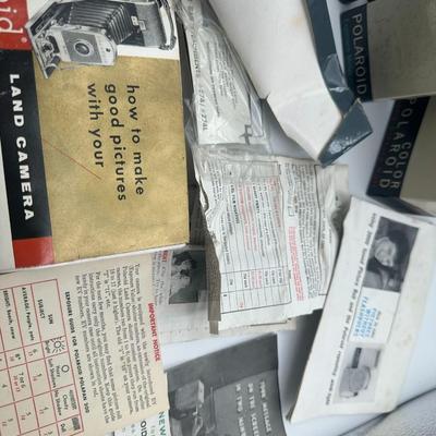 Sale Photo Thumbnail #47: Wow!  This is the most comprehensive vintage camera set we've ever come across!  Everything you could ever want for the 1950's Polaroid including sealed film, flash aka Wink Light, meters, carrying case, film paper, print coat and all the manuals you can 