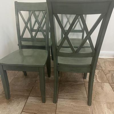 Sale Photo Thumbnail #172: Four dining chairs.