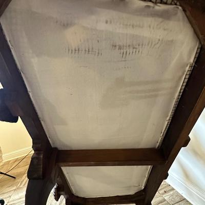 Sale Photo Thumbnail #176: The wood frame is in excellent condition. Upholstered seat has some staining—see photos for details. Would be beautiful reupholstered.

Dimensions: 39” tall x 46” wide x 17” deep