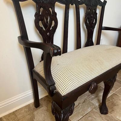 Sale Photo Thumbnail #184: The wood frame is in excellent condition. Upholstered seat has some staining—see photos for details. Would be beautiful reupholstered.

Dimensions: 39” tall x 46” wide x 17” deep