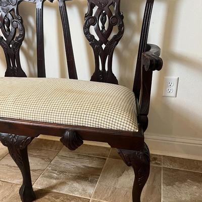 Sale Photo Thumbnail #185: The wood frame is in excellent condition. Upholstered seat has some staining—see photos for details. Would be beautiful reupholstered.

Dimensions: 39” tall x 46” wide x 17” deep