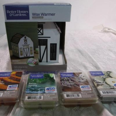 New in box Wax Warmer, with 4 pkgs scented wax