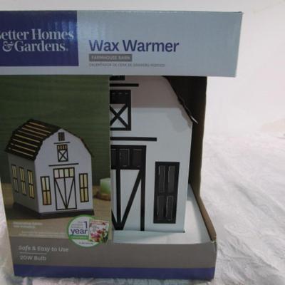 New in box Wax Warmer, with 4 pkgs scented wax
