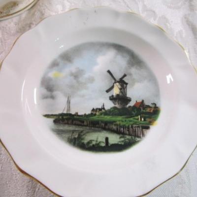 2 small decorative plates, 1 ceramic jar with lid