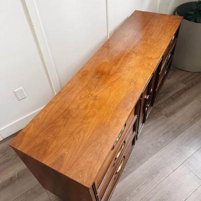 Vintage Mid Century 9-Drawer Walnut Dresser Credenza w/Center Cabinet Door, Sculptural Facade, Brass Hardware & Tapered Legs