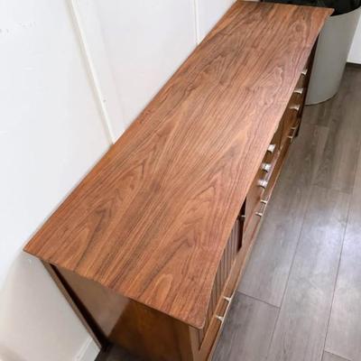 Vintage Mid Century 1960’s 9-Drawer Walnut Dresser Credenza w/Fluted Facade Cabinet Door, Chrome Pulls & Tapered Legs by Harmony House