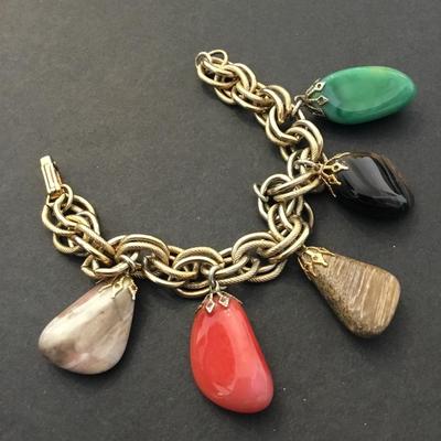 Beautiful, vintage, multi precious stone charm bracelet. I hate that.