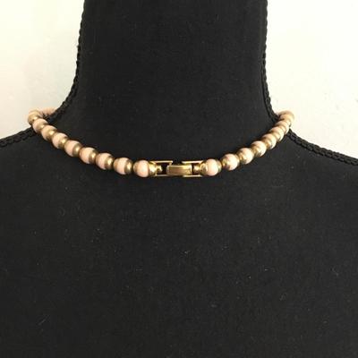 Beautiful vintage Avon lite blush pink beard, and gold toned necklace