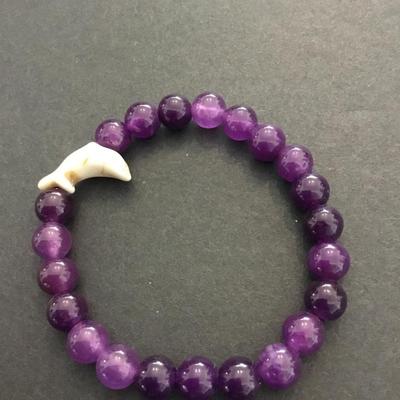 Beautiful, purple, amethyst, beaded stretch bracelet, carved dolphin