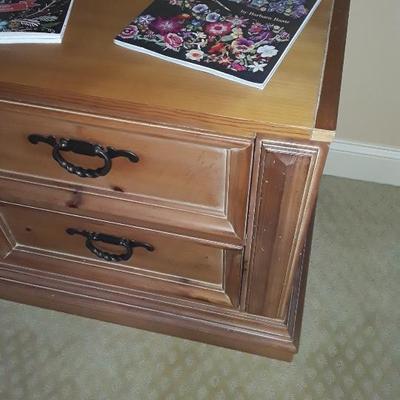 Sale Photo Thumbnail #8: This is the lower part of an armoire with a shelf laid on top. Owner used it as TV stand. 48 wide x 20 deep.