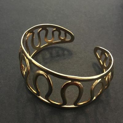 Vintage Sarah Coventry, gold toned cuff bracelet