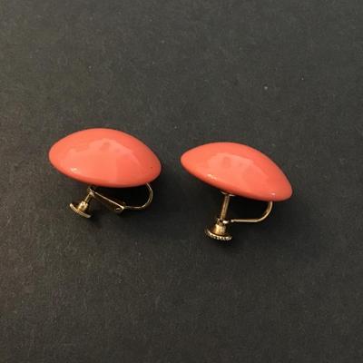 Vintage coral Bakelite circular screw back earrings
