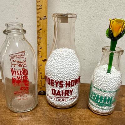 Sale Photo Thumbnail #547: Antique TIDEYS HOME DAIRY Glass Quart Milk Bottle Eau Claire Michigan
Vintage Glass Milk Bottle Winder Dairy Salt Lake City Utah Red Graphics 
Green Graphics Vintage Mild Bottle Jensen Dairy

in good used condition