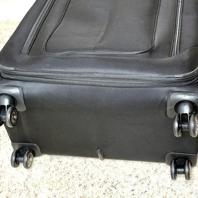 Large TravelPro Spinner Suitcase