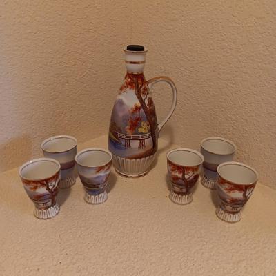 LILY KINA HAND PAINTED SAKI DECANTER AND CUPS