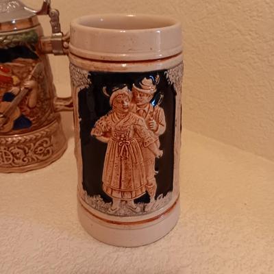 2 WESTERN GERMANY STEINS AND A MUSICAL STEIN