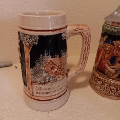 2 WESTERN GERMANY STEINS AND A MUSICAL STEIN