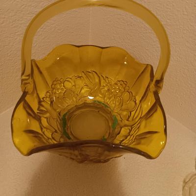 YELLOW GLASS BASKET AND 2 TEA CUPS AND SAUCER SETS