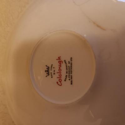 YELLOW GLASS BASKET AND 2 TEA CUPS AND SAUCER SETS