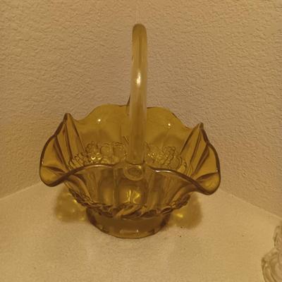YELLOW GLASS BASKET AND 2 TEA CUPS AND SAUCER SETS