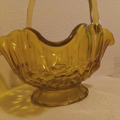 YELLOW GLASS BASKET AND 2 TEA CUPS AND SAUCER SETS