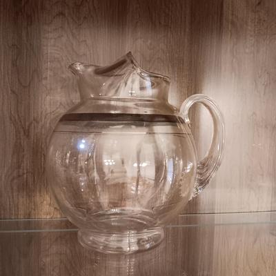 GLASS PITCHER AND DRINKING GLASSES WITH A SILVER BAND
