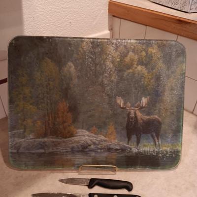 SHOWTIME SIX STAR CUTLERY AND A GLASS CUTTING BOARD