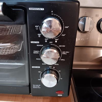 POWER XL AIR FRYER GRILL, WOODEN CUTTING BOARD AND FAUX PLANT