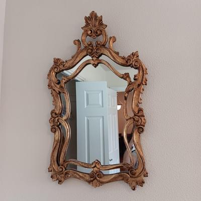 2 DRAWER NIGHT STAND, 2 SMALL LAMPS AND A GOLD FRAMED WALL MIRROR