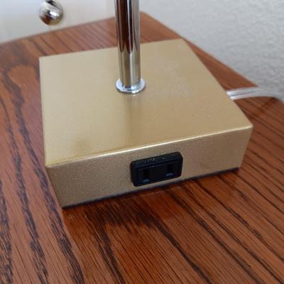 2 DRAWER NIGHT STAND, 2 SMALL LAMPS AND A GOLD FRAMED WALL MIRROR
