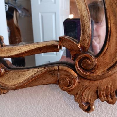 2 DRAWER NIGHT STAND, 2 SMALL LAMPS AND A GOLD FRAMED WALL MIRROR