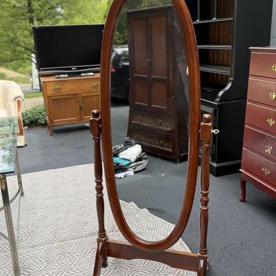 Oval cherry floor mirror