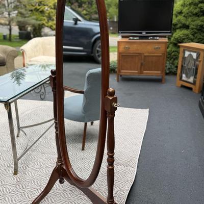 Oval cherry floor mirror