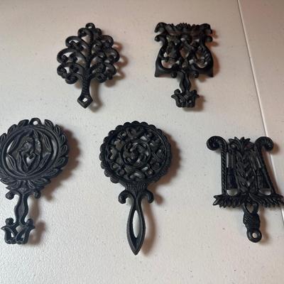 Sale Photo Thumbnail #98: 5 cute mini trivets and they’re cast iron!
