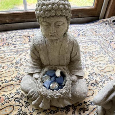 Concrete Buddha and other garden pieces
