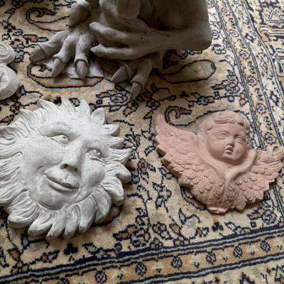 Concrete Buddha and other garden pieces