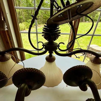 Gorgeous three light fixture with four matching sconces