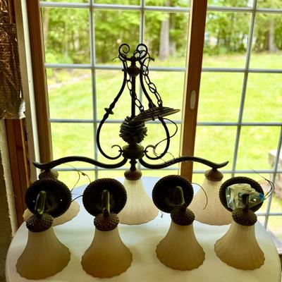 Gorgeous three light fixture with four matching sconces