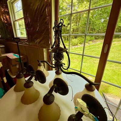 Gorgeous three light fixture with four matching sconces