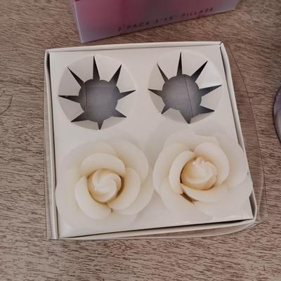 AN ASSORTMENT OF CANDLES
