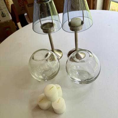Two Pottery Barn votive holders and two glass vases